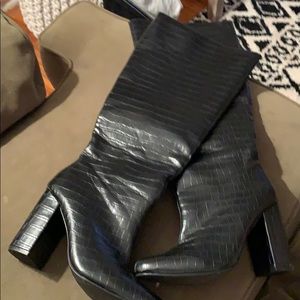 Black knee length boots